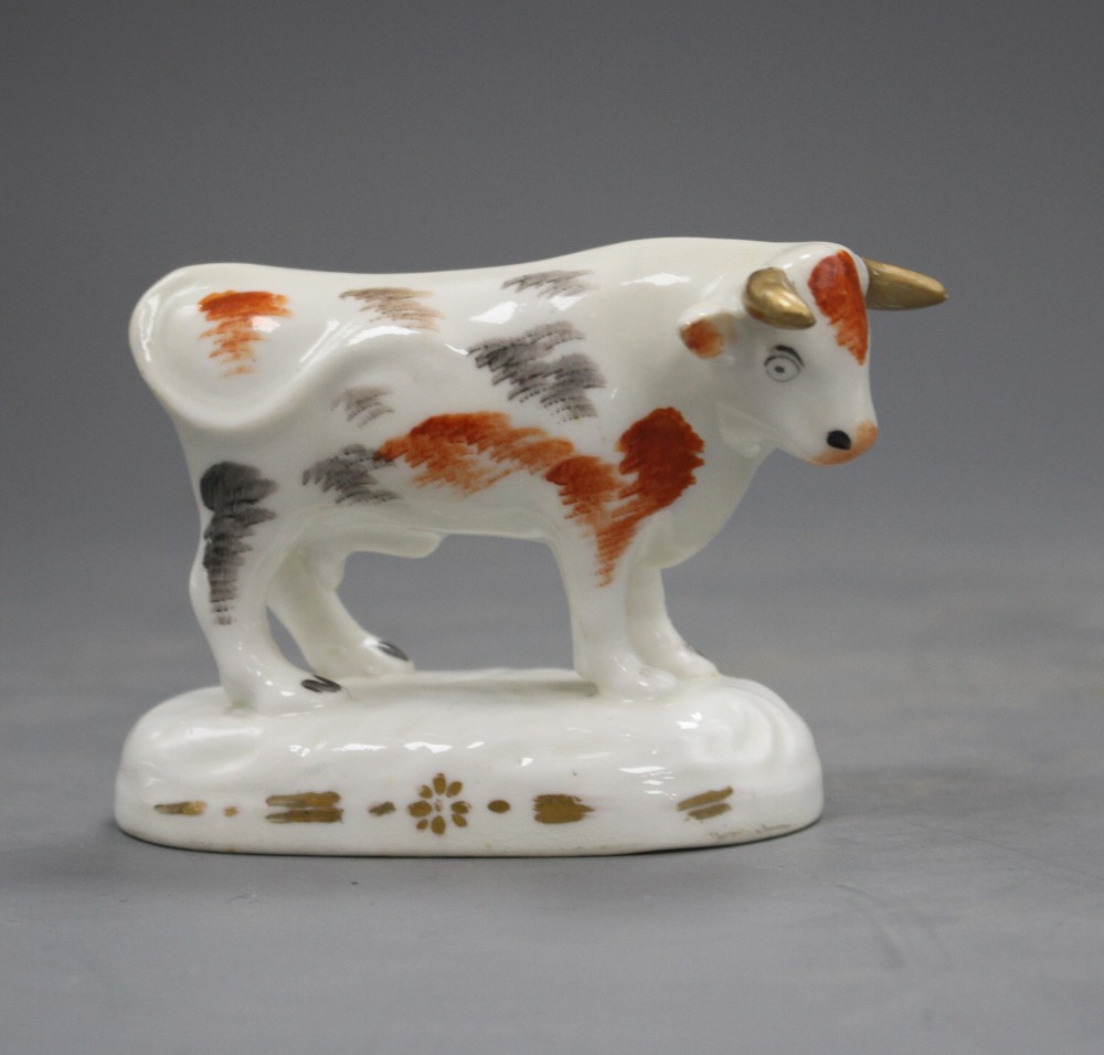 A Staffordshire porcelain figure of a standing bull, c.1830-40, L.9.5cm